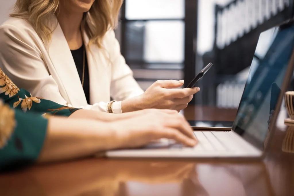 two-women-working-on-setting-up-google-local-services-ads