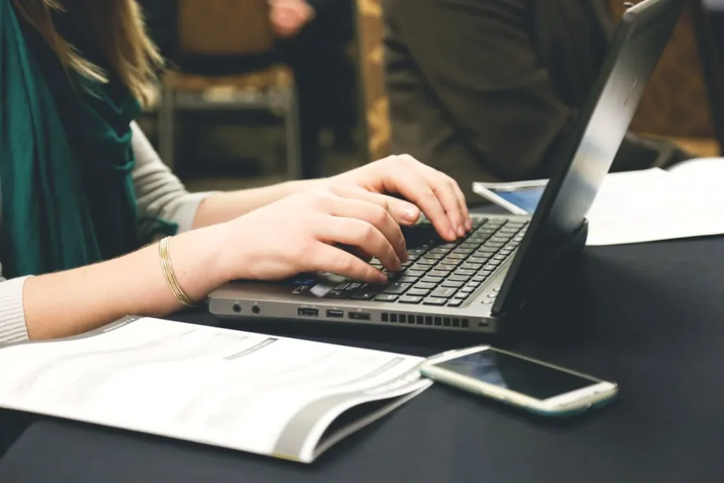 woman-typing-on-laptop